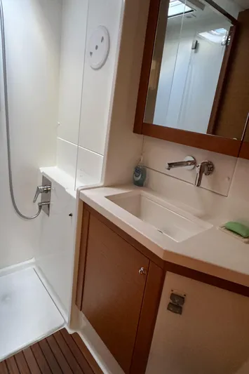  Yacht Photos Pics Bathroom interior of 2017 Lagoon 450 F yacht with shower and sink.
