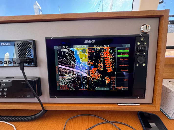 Yacht Photos Pics Navigation system on a 2017 Lagoon 450 F catamaran, displaying detailed marine charts.