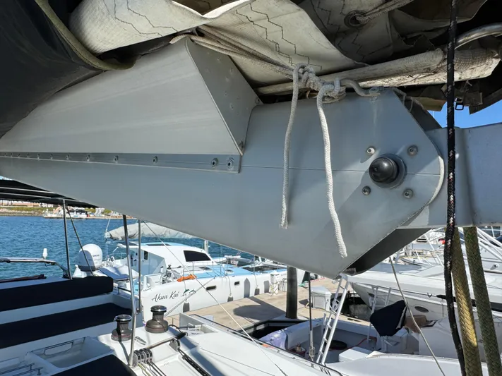  Yacht Photos Pics Close-up of 2017 Lagoon 450 F catamaran's sail mechanism at a marina.