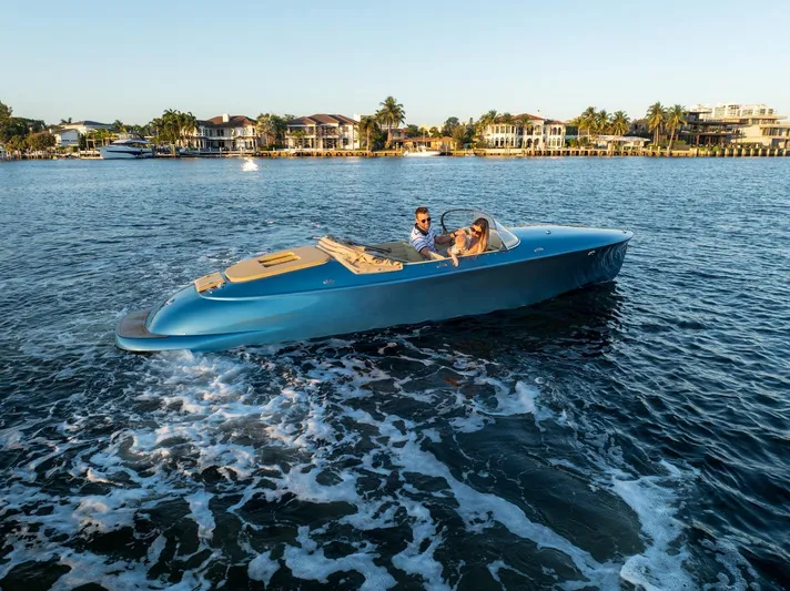  Yacht Photos Pics 2022 Seven Seas Yachts Hermes Speedster cruising on a sunny waterfront.