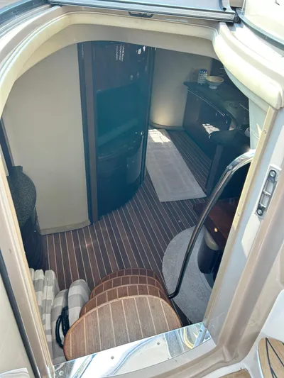  Yacht Photos Pics Interior view of 2007 Sea Ray 52 Sundancer yacht with striped flooring and seating.