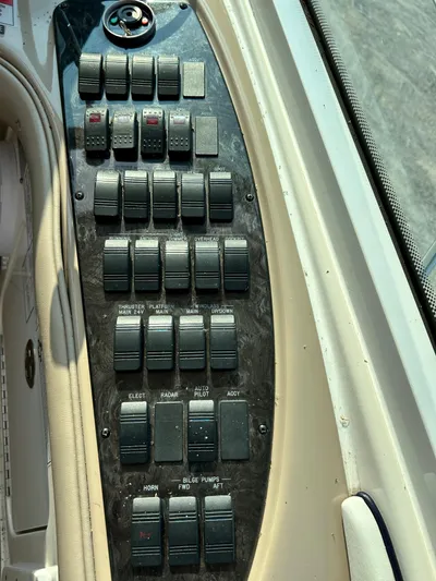  Yacht Photos Pics Control panel of a 2007 Sea Ray 52 Sundancer yacht with multiple switches.