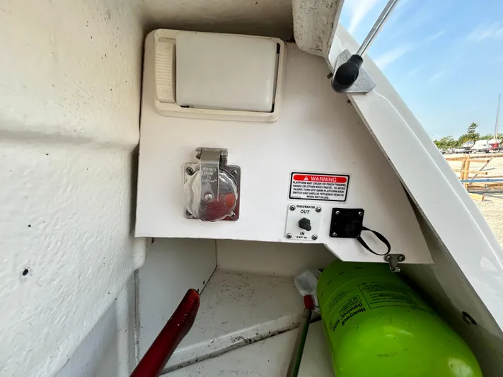  Yacht Photos Pics 2007 Sea Ray 52 Sundancer boat interior with safety equipment and electrical panel.