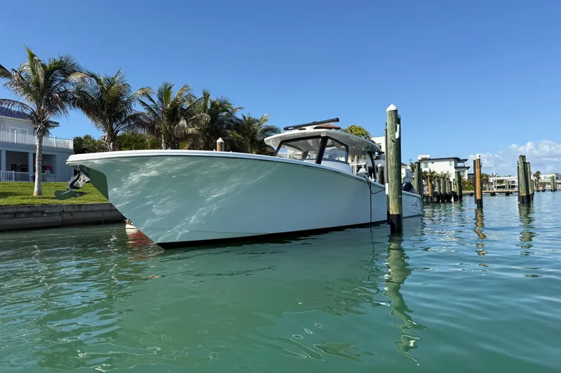  Yacht Photos Pics 2020 Streamline 45 boat docked in sunny marina with palm trees.