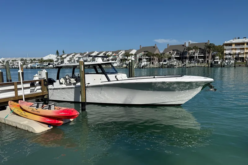  Yacht Photos Pics Streamline 45 boat docked in marina with kayaks, 2020 model.