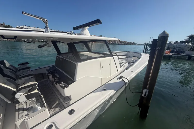  Yacht Photos Pics 2020 Streamline 45 boat docked in a sunny marina, showcasing sleek design and modern features.