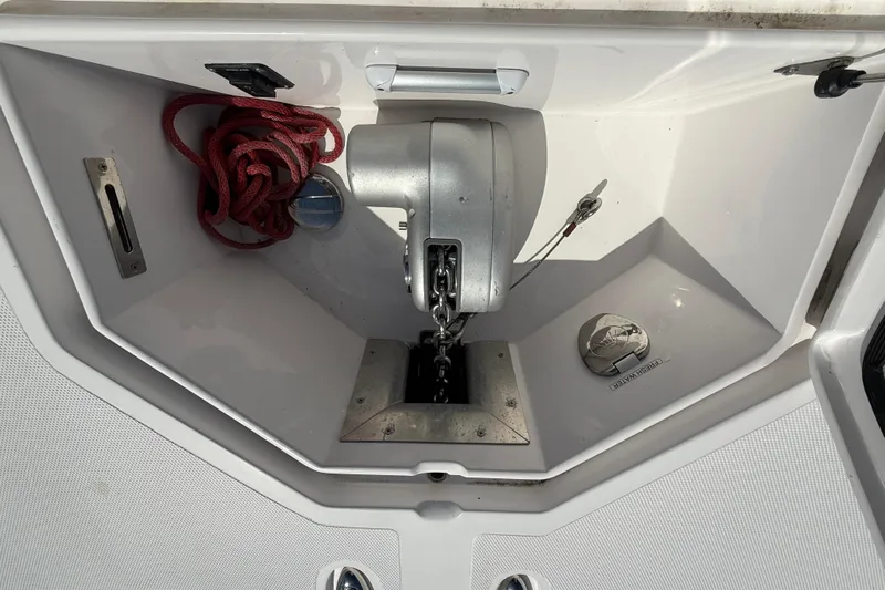  Yacht Photos Pics Anchor compartment of 2020 Streamline 45 boat with red rope and winch.
