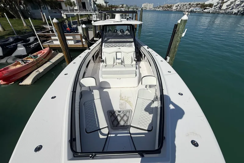  Yacht Photos Pics Streamline 45 boat docked in marina, 2020 model, featuring spacious seating and sleek design.