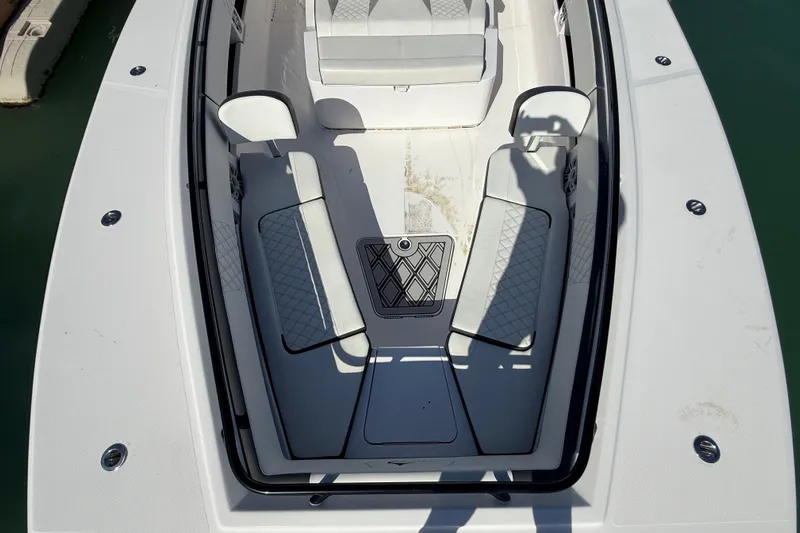  Yacht Photos Pics Front deck of 2020 Streamline 45 boat with seating and storage compartments.