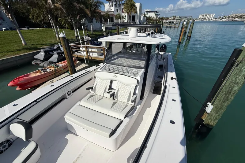  Yacht Photos Pics Streamline 45 boat docked in marina, showcasing sleek design and luxurious seating, 2020 model.