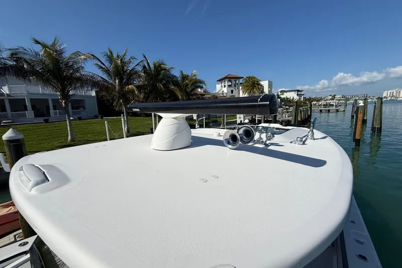  Yacht Photos Pics 2020 Streamline 45 boat docked by palm trees and waterfront homes.