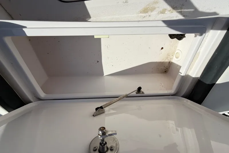  Yacht Photos Pics Open storage compartment in 2020 Streamline 45 boat, showing interior details.