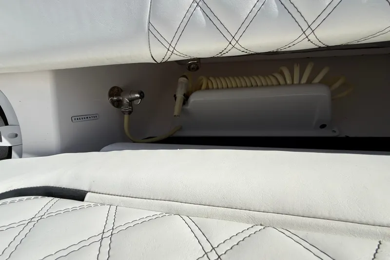  Yacht Photos Pics White leather interior of 2020 Streamline 45 with freshwater hose and fittings.