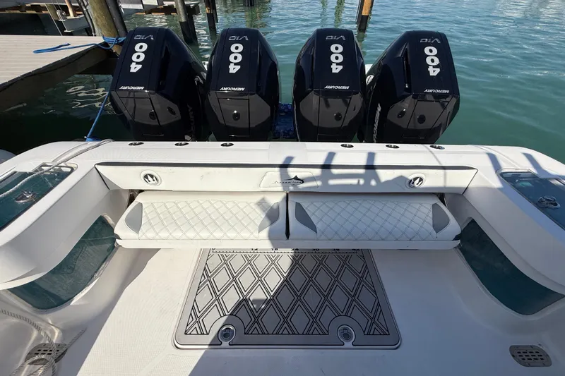  Yacht Photos Pics Four Mercury 400 engines on a 2020 Streamline 45 boat at a dock.