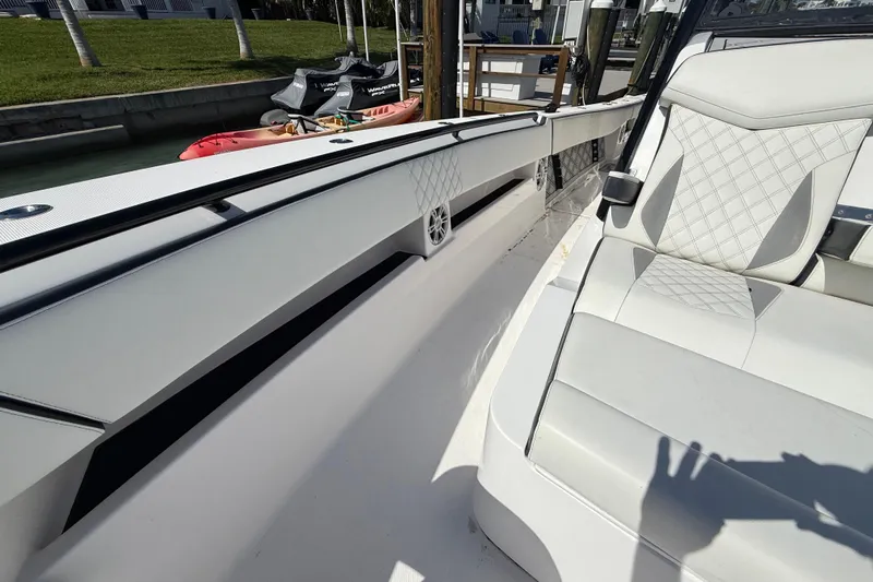  Yacht Photos Pics Luxurious interior of 2020 Streamline 45 boat with white seating and sleek design.