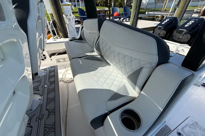  Yacht Photos Pics Luxurious seating on 2020 Streamline 45 boat with stylish upholstery and cup holder.