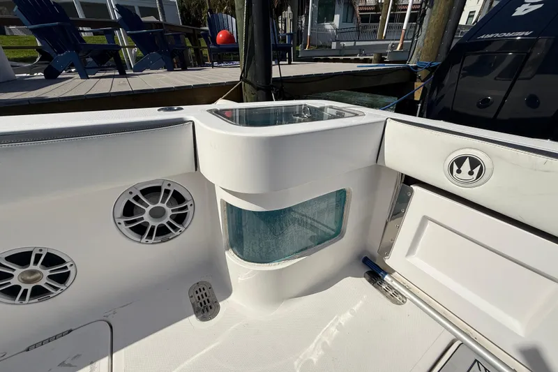  Yacht Photos Pics Boat interior with speakers and storage, Streamline 45 model, 2020, docked near wooden deck.