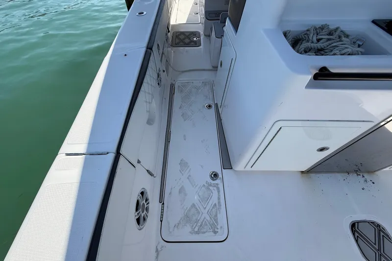  Yacht Photos Pics 2020 Streamline 45 boat deck with storage compartments and coiled rope.