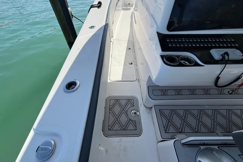  Yacht Photos Pics 2020 Streamline 45 boat deck with sleek design and modern controls by the water.