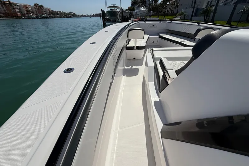  Yacht Photos Pics Streamline 45 boat, 2020 model, sleek design, spacious seating, docked by calm waters.