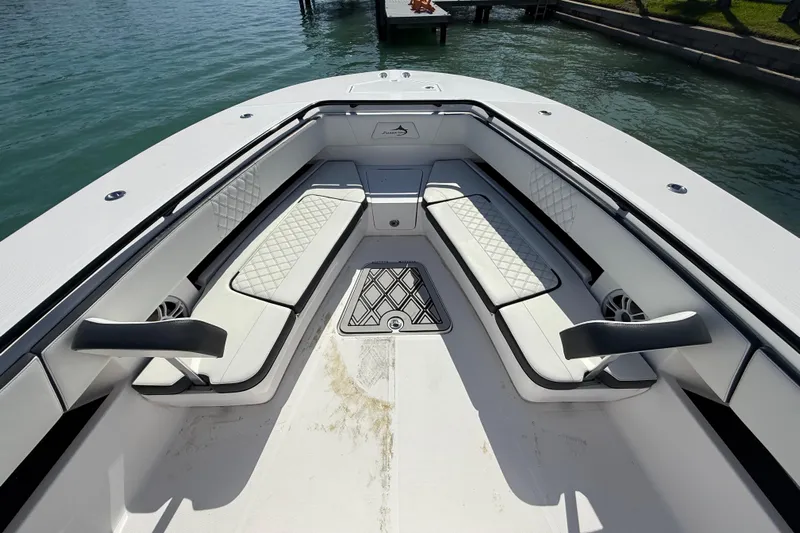  Yacht Photos Pics Luxurious seating area on a 2020 Streamline 45 boat, featuring elegant white upholstery.
