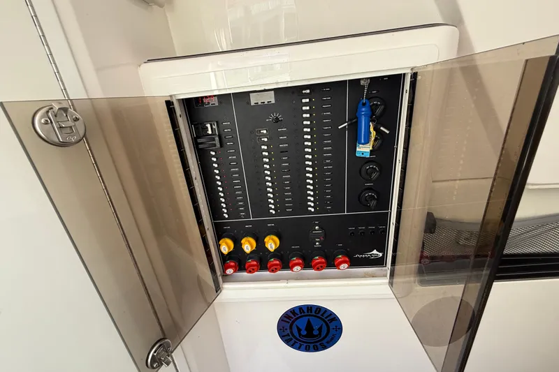  Yacht Photos Pics Electrical panel of a 2020 Streamline 45 boat with open glass doors.