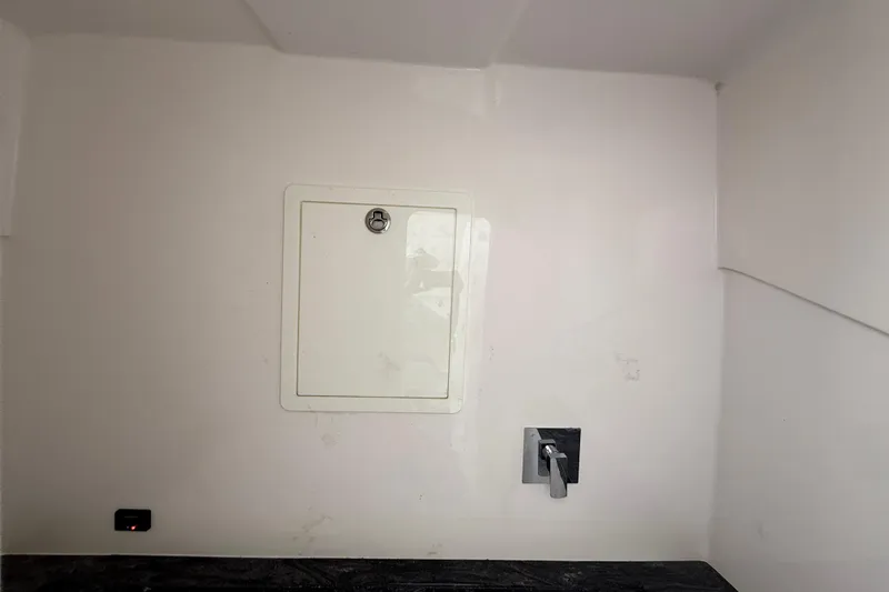  Yacht Photos Pics Interior of 2020 Streamline 45 with wall hatch and faucet.