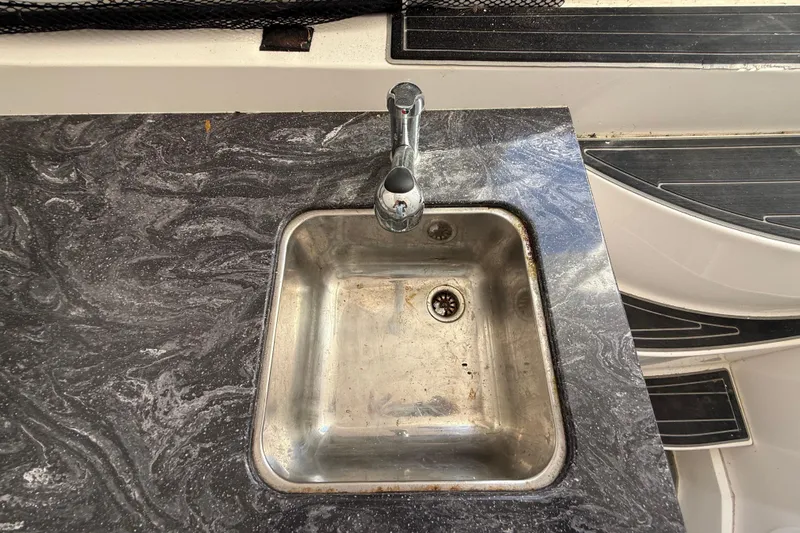 Yacht Photos Pics Stainless steel sink on marble countertop in 2020 Streamline 45 model.