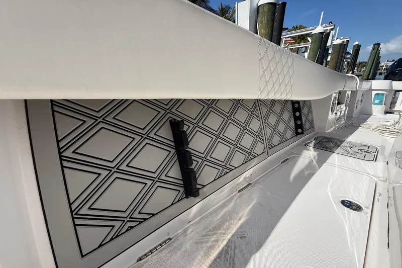  Yacht Photos Pics 2020 Streamline 45 boat interior with geometric panel design and white upholstery.