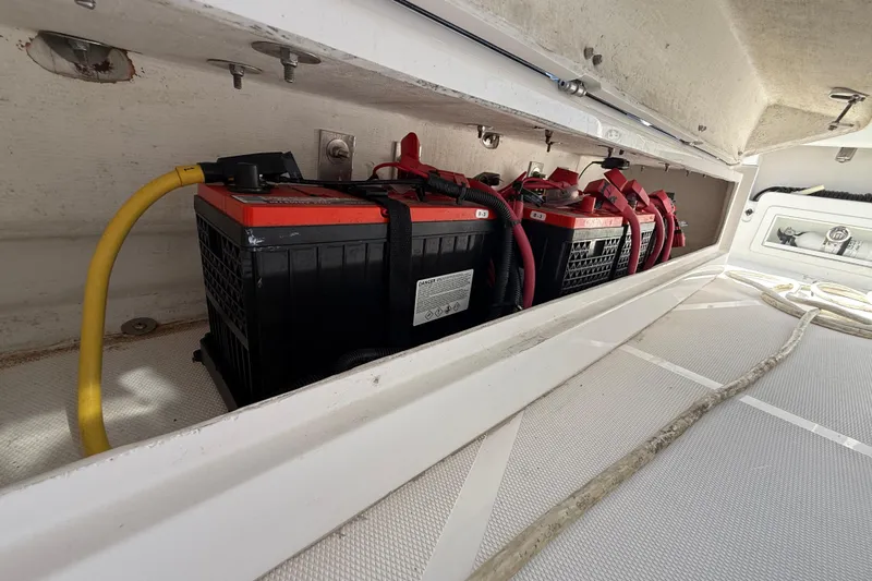  Yacht Photos Pics Battery compartment of a 2020 Streamline 45 boat with multiple batteries and cables.