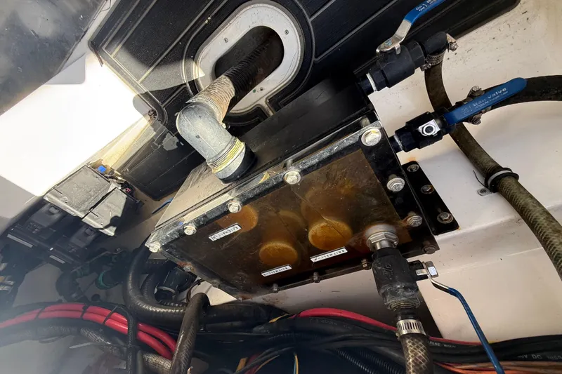  Yacht Photos Pics Engine compartment of a 2020 Streamline 45 with visible hoses and components.