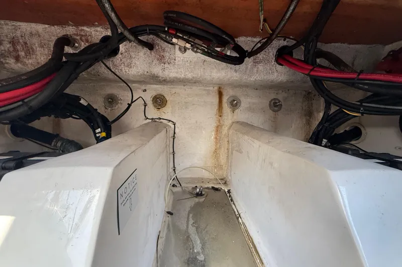  Yacht Photos Pics Interior view of a 2020 Streamline 45 boat engine compartment with visible wiring.