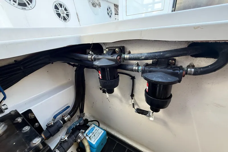  Yacht Photos Pics Engine compartment of 2020 Streamline 45 boat showing fuel filters and hoses.