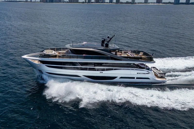  Yacht Photos Pics 2022 Princess X95 yacht cruising on open water, showcasing luxury design and modern features.