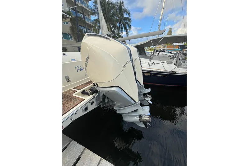 Para-dice Yacht Photos Pics 2023 Chris-Craft Catalina 30 with powerful Mercury outboard engines docked at marina.
