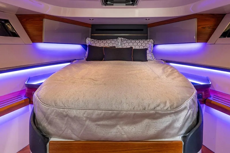  Yacht Photos Pics Luxurious cabin interior of 2024 Boston Whaler 405 Conquest with ambient lighting.