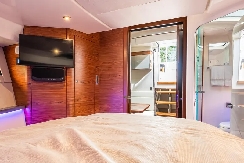  Yacht Photos Pics Luxurious interior of 2024 Boston Whaler 405 Conquest with wood accents and modern amenities.