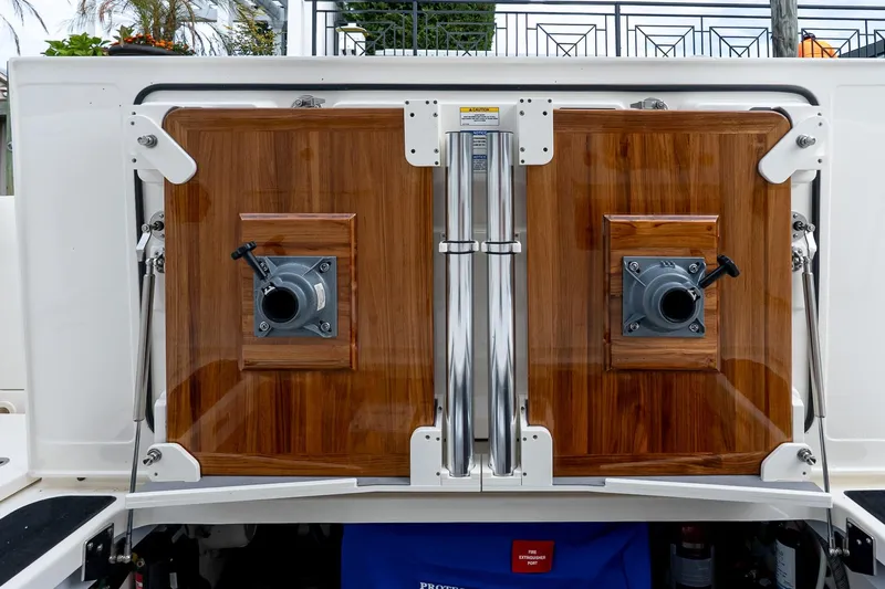  Yacht Photos Pics 2024 Boston Whaler 405 Conquest, featuring sleek wooden paneling and stainless steel accents.