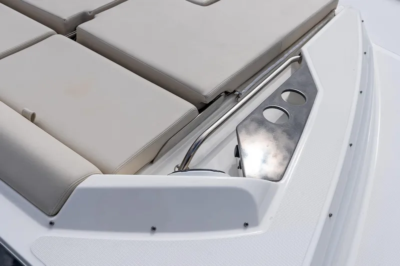  Yacht Photos Pics 2024 Boston Whaler 405 Conquest boat deck with cushioned seating and stainless steel cup holders.