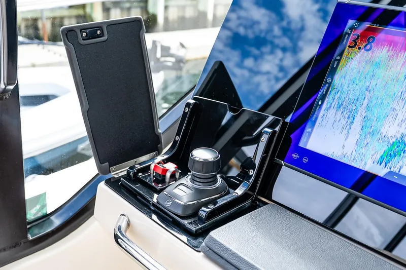  Yacht Photos Pics 2024 Boston Whaler 405 Conquest helm with joystick control and digital display.