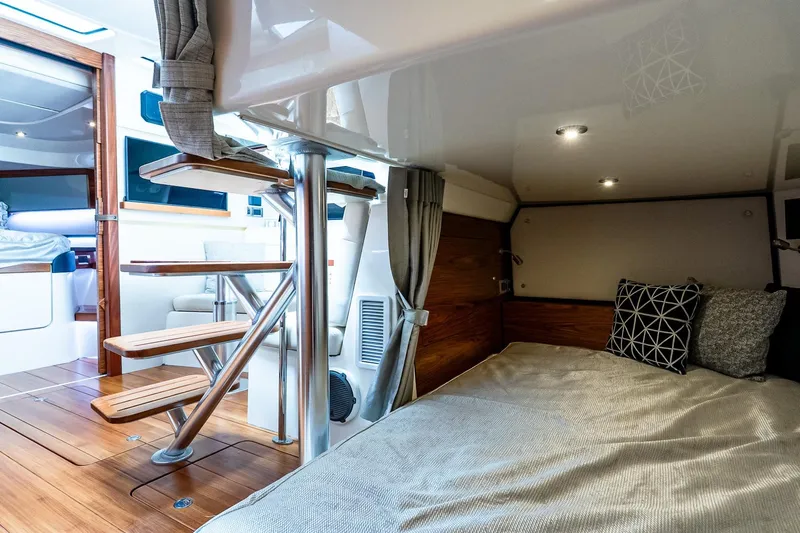  Yacht Photos Pics Luxurious interior of 2024 Boston Whaler 405 Conquest with cozy cabin and modern design.