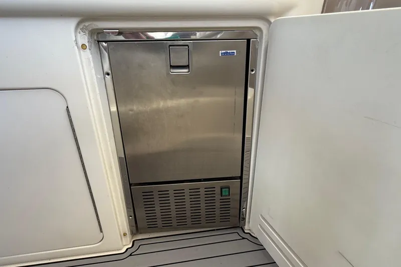 Notorious Yacht Photos Pics Stainless steel refrigerator on 2003 Sea Ray 460 Sundancer yacht.