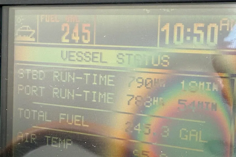 Notorious Yacht Photos Pics Display screen showing vessel status and fuel data for 2003 Sea Ray 460 Sundancer.