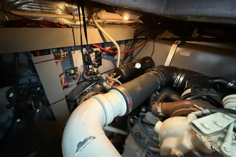 Notorious Yacht Photos Pics Engine room of 2003 Sea Ray 460 Sundancer with visible components and wiring.