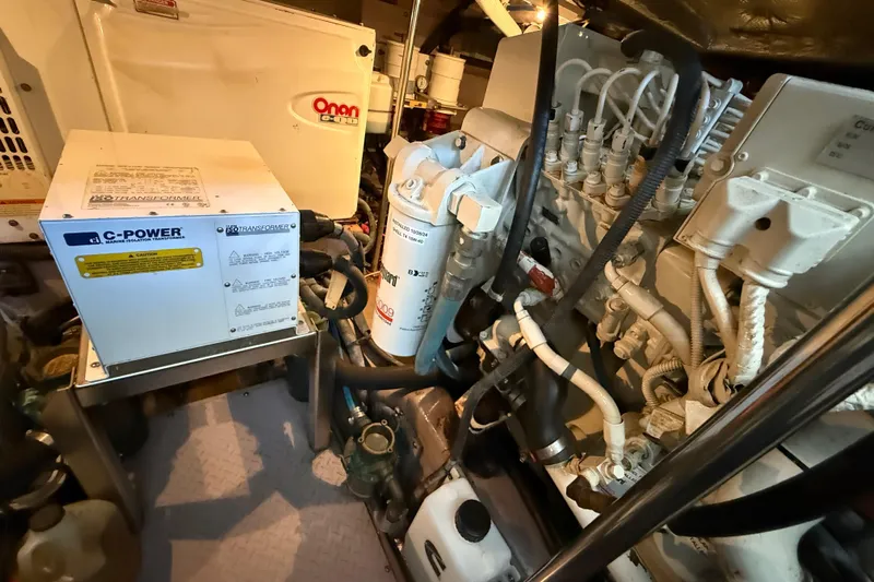 Notorious Yacht Photos Pics Engine room of a 2003 Sea Ray 460 Sundancer with C-Power and Onan equipment.