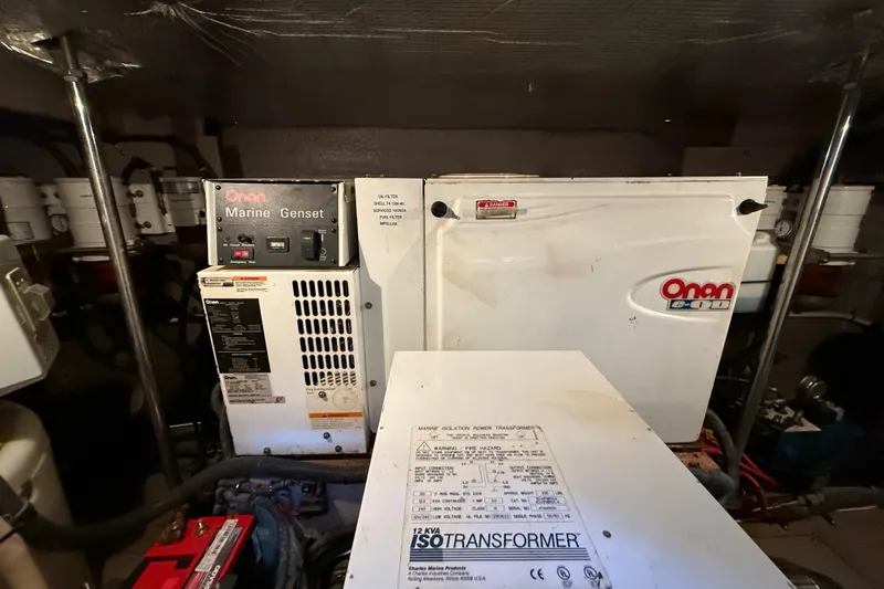 Notorious Yacht Photos Pics Engine room of 2003 Sea Ray 460 Sundancer with Onan Marine Genset and IsoTransformer.