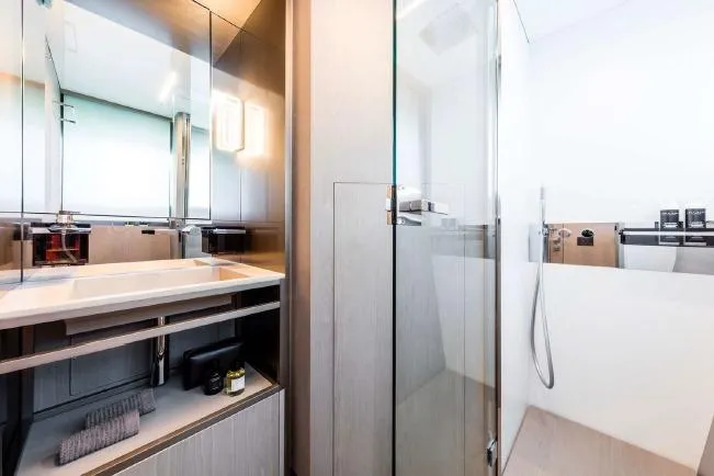  Yacht Photos Pics Luxurious bathroom interior on 2017 Ferretti Yachts 850, featuring modern shower and sleek design.