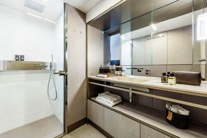  Yacht Photos Pics Luxurious bathroom in 2017 Ferretti Yachts 850, featuring modern shower and elegant vanity.