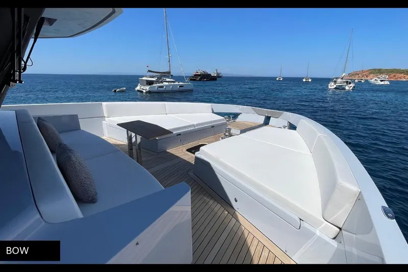  Yacht Photos Pics Luxurious 2023 Numarine 22 XP yacht bow with elegant seating and ocean view.