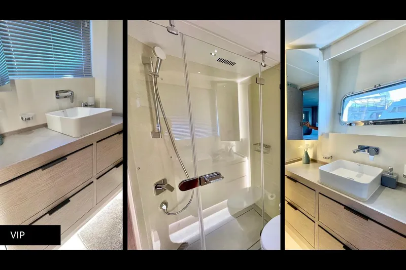  Yacht Photos Pics Luxurious bathroom interior of 2023 Numarine 22 XP yacht, featuring modern sink and shower.